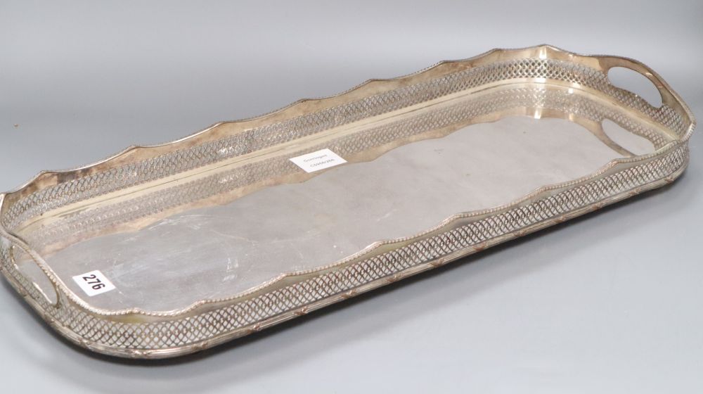 A silver plated oval tray with pierced gallery, width 62cm